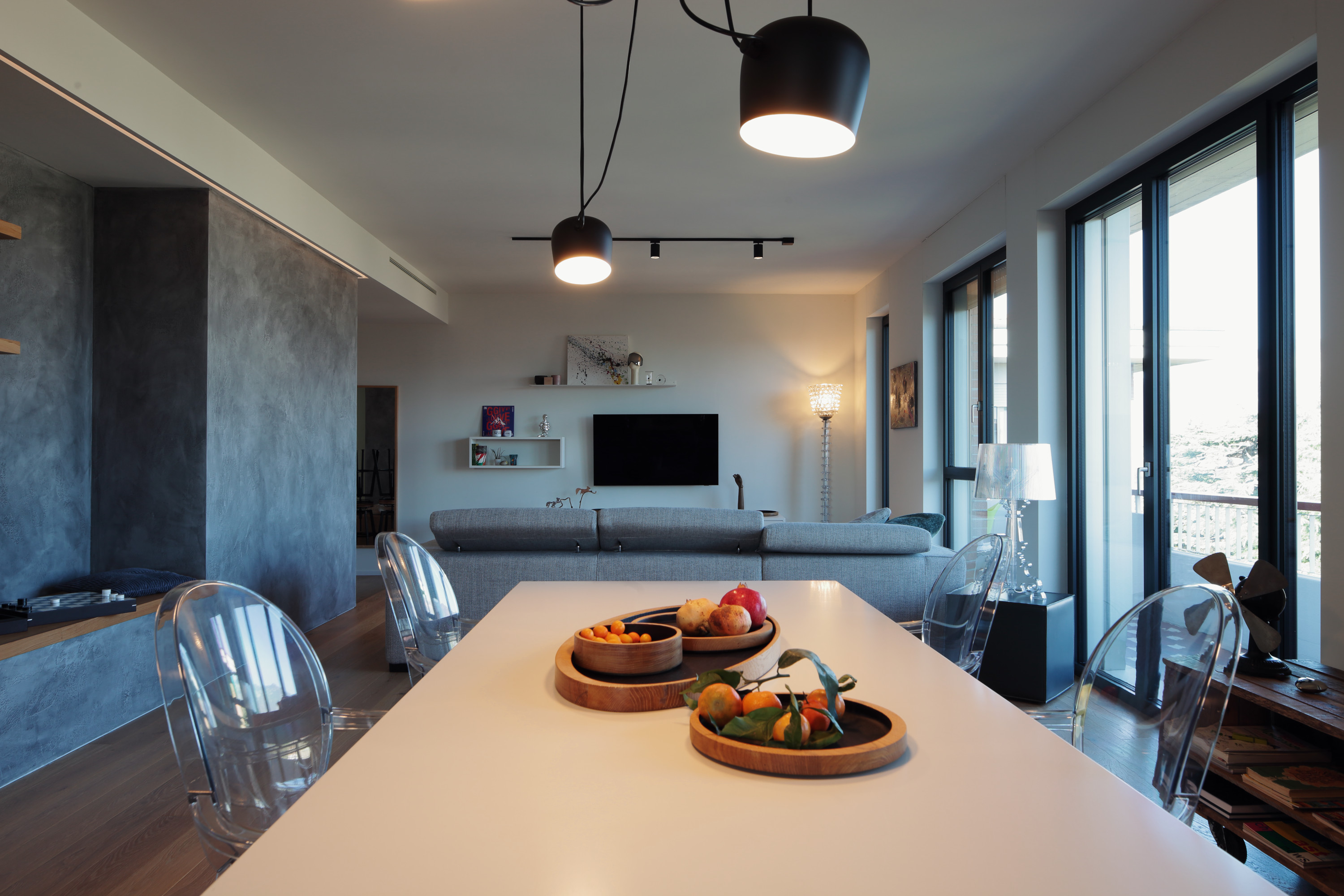 Casa EA, living area and central volume with bespoke furniture